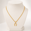Cadena Clip + Dije Herradura — Oro Laminado 18K - ROKKA JOYERIA